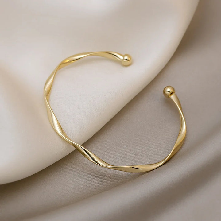 Elara – Elegancka Bransoletka z Zawijasami
