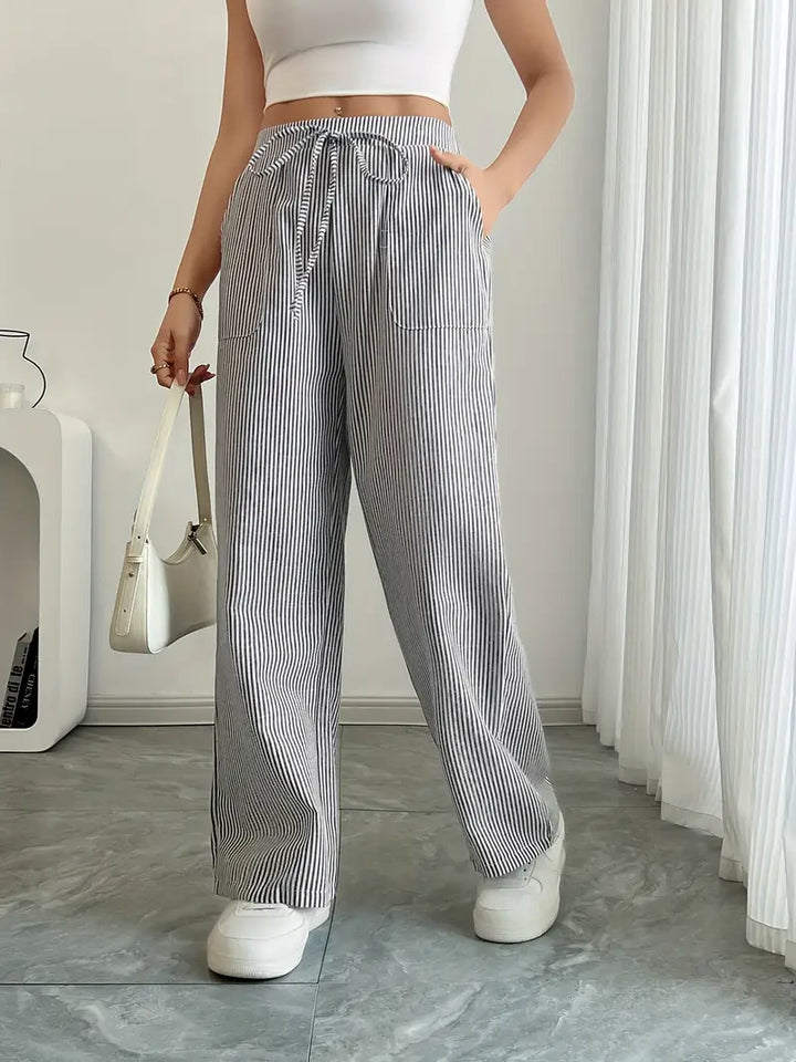 Alina – Eleganckie Spodnie w Paski z Kieszeniami